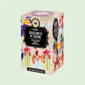 Confezione di tè nero biologico "Darjeeling is My Darling" del brand Ministry of Tea, decorata con illustrazioni colorate in stile etnico. Contiene 20 filtri avvolti singolarmente.