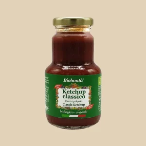 Barattolo in vetro da 250g di ketchup classico biologico Biobontà con etichetta verde, tappo dorato e diciture "ricco e polposo", "gluten free" e "lactose free".