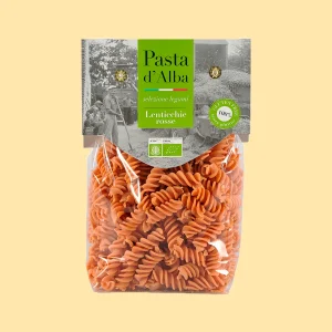Confezione da 250g di fusilli Pasta d’Alba con farina di lenticchie rosse biologiche, senza glutine, in busta trasparente con etichetta verde.