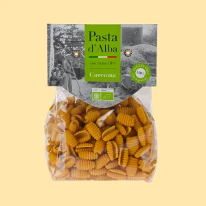 Confezione da 250g di gnocchetti biologici Pasta d’Alba con farina di riso e curcuma, in busta trasparente con etichetta verde.