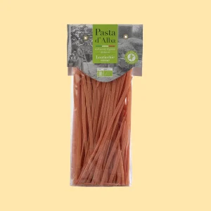 Confezione da 250g di tagliatelle biologiche Pasta d’Alba a base di lenticchie rosse, in busta trasparente con etichetta verde.