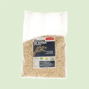 Confezione da 2kg di Fiocchi di Avena Integrali BIO Stella, etichetta blu e bianca con spiga dorata, in sacchetto trasparente.