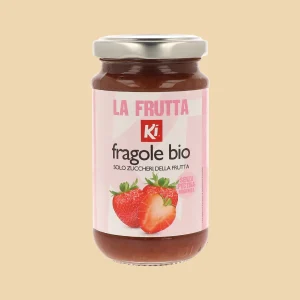 Vasetto di composta di fragole biologiche Ki da 220g, etichetta rosa con fragole fresche in evidenza