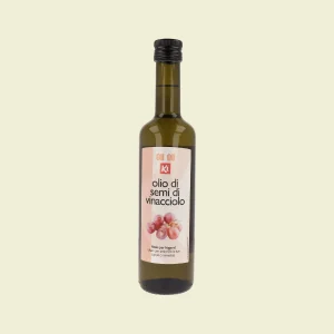 Bottiglia di olio di semi di vinacciolo biologico KI da 500 ml, con etichetta frontale beige e immagine di acini d’uva; vista frontale