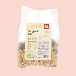 Confezione frontale del muesli l’Originale biologico Ki da 750g, con fiocchi di cereali integrali, uvetta e frutta secca visibili nella busta trasparente.